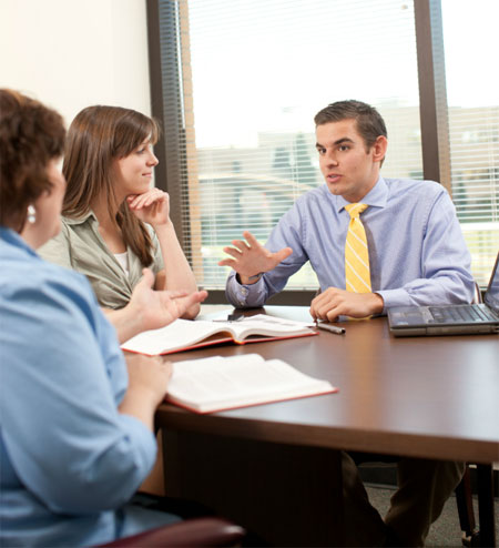 photo of business professionals in a conference room