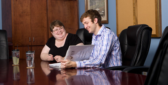 photo of business professionals in a conference room