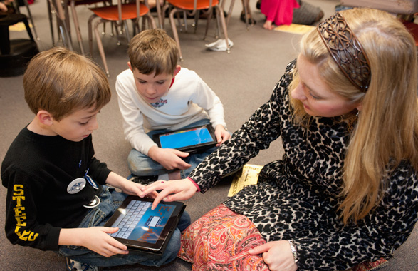 Student teacher with children