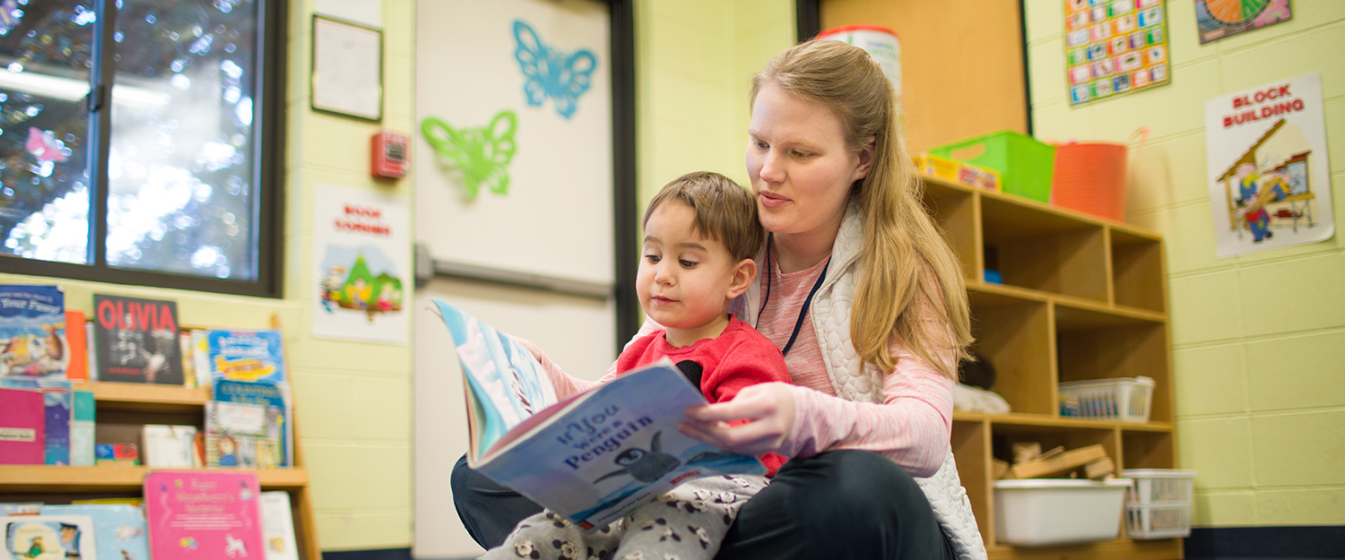 Student teacher with children