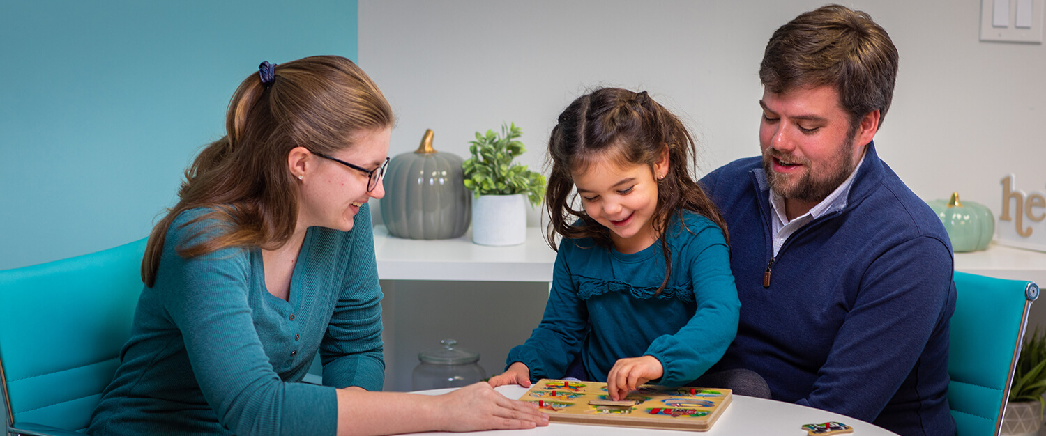 Student teacher with children