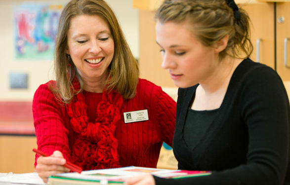 Student teacher with children