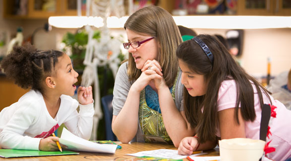 Student teacher with children