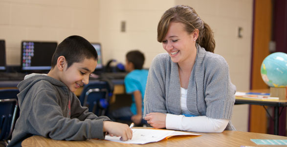 Student teacher with children