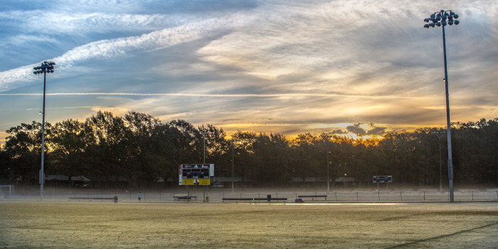 Sunrise over Alumni Stadium Field