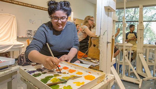 students painting