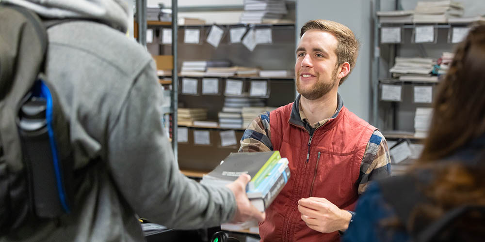 Students buy textbooks for the new semester, BJU, January 11, 2022. (Derek Eckenroth)