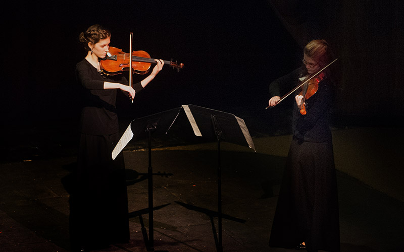 students playing strings