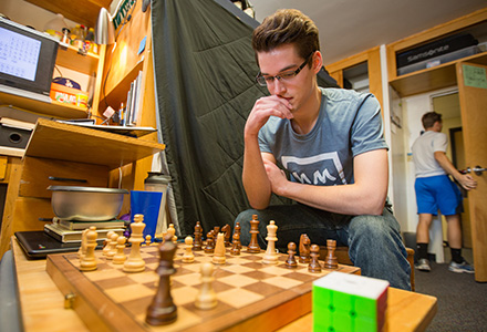 student playing chess