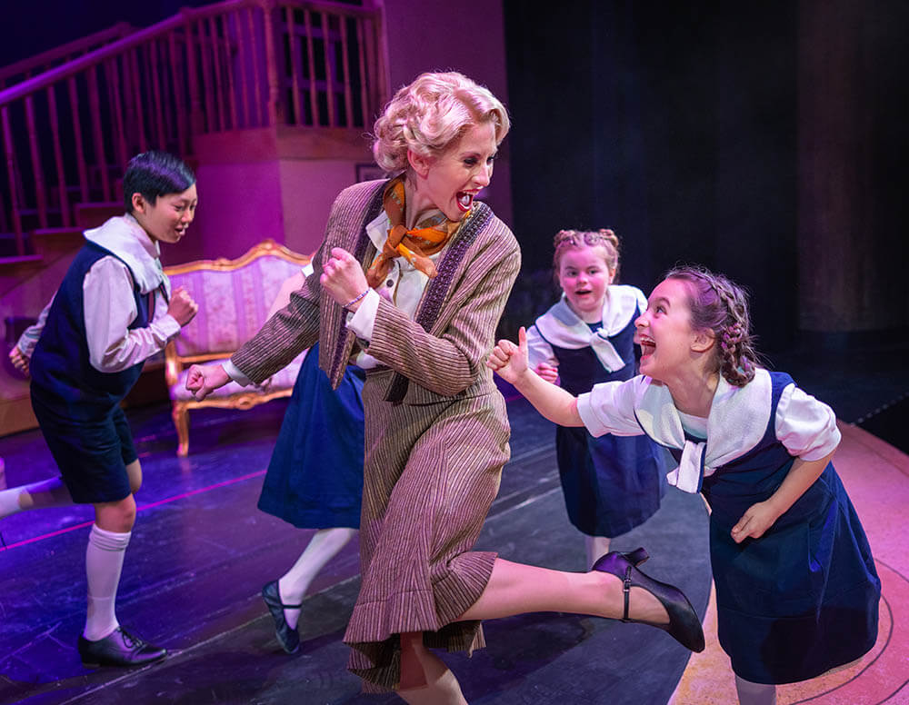 A candid moment from a live performance of The Sound of Music during a marketing promotional photoshoot at Bob Jones University on March 3, 2025. (Photo by Derek Eckenroth)